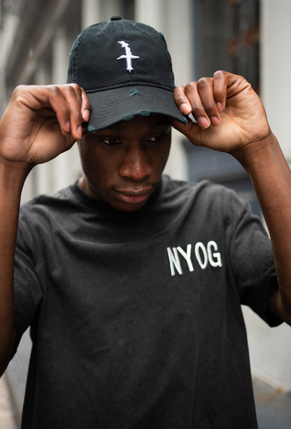 Acid washed gray t-shirt. Relaxed fit with white NYOG embroidered on left chest and born in the apple direct to garment graphic design on back.