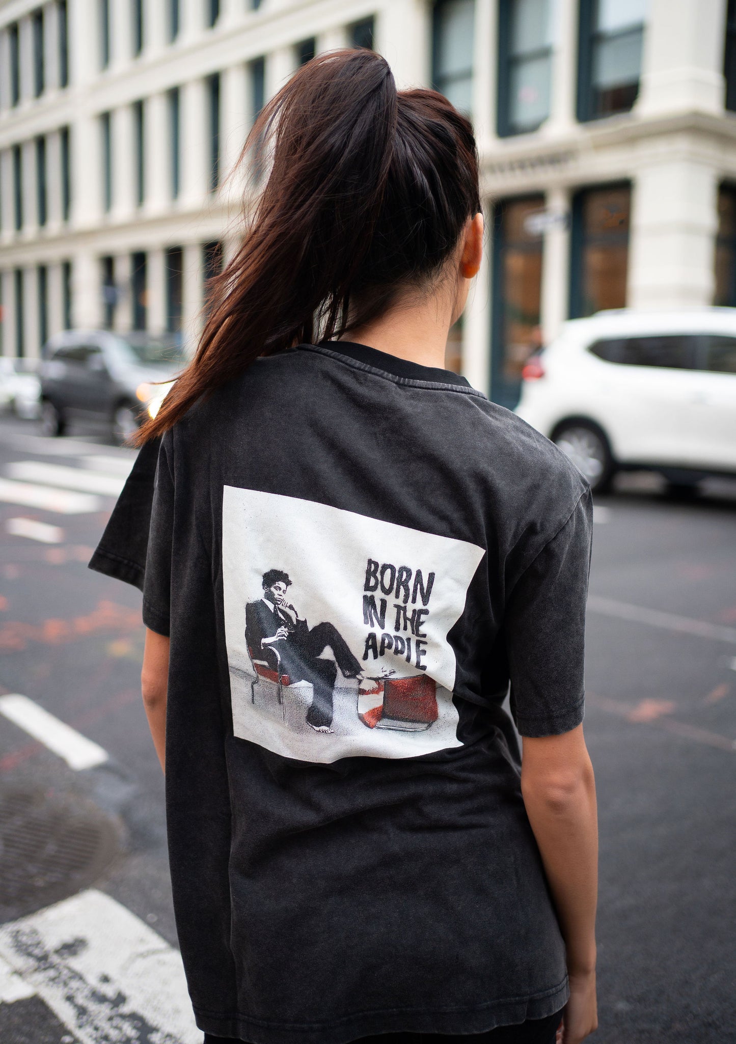 Acid washed gray t-shirt. Relaxed fit with white NYOG embroidered on left chest and born in the apple direct to garment graphic design on back.