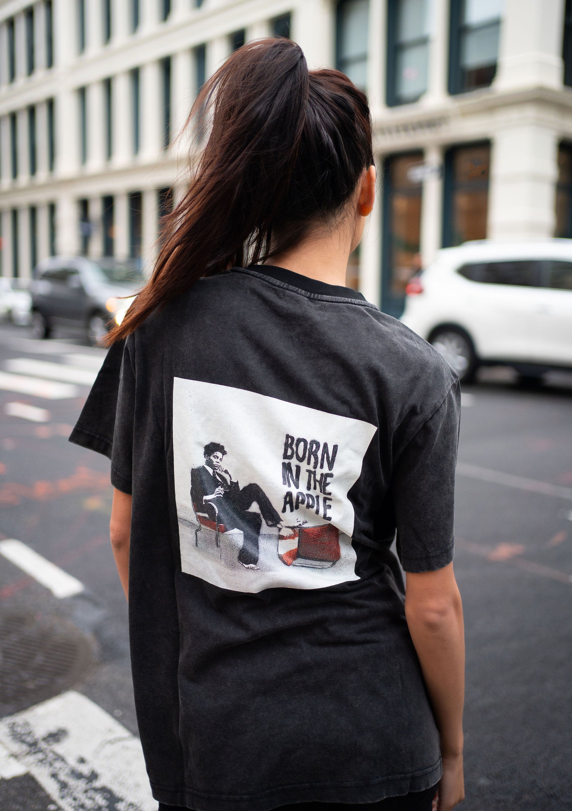 Acid washed gray t-shirt. Relaxed fit with white NYOG embroidered on left chest and born in the apple direct to garment graphic design on back.